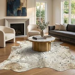 gold speckled cowhide rug in the living room