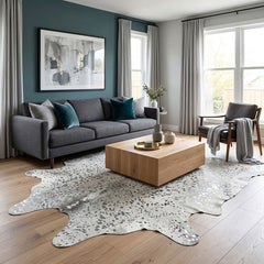 Genuine silver speckled cowhide rug in natural hide shape