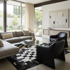 cowhide patchwork rug in chess block pattern in black and white