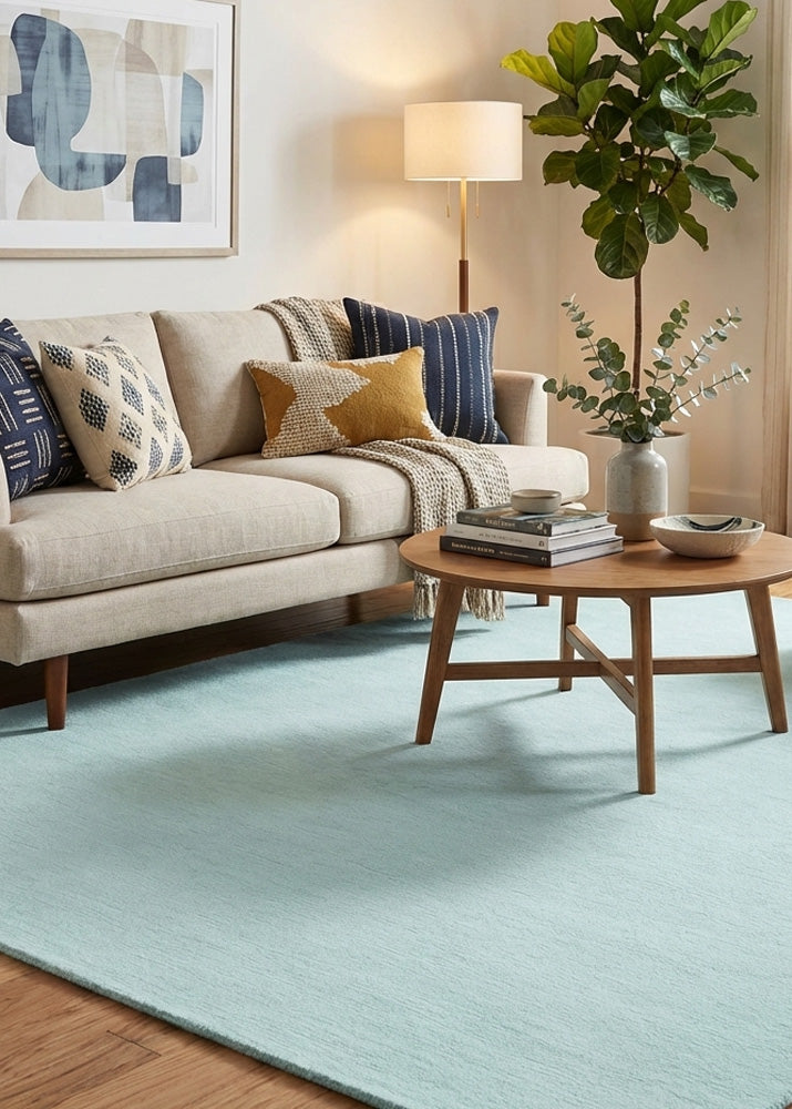 Light blue wool rug in modern living room