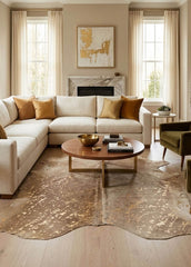 gold acid washed cowhide rug in living room