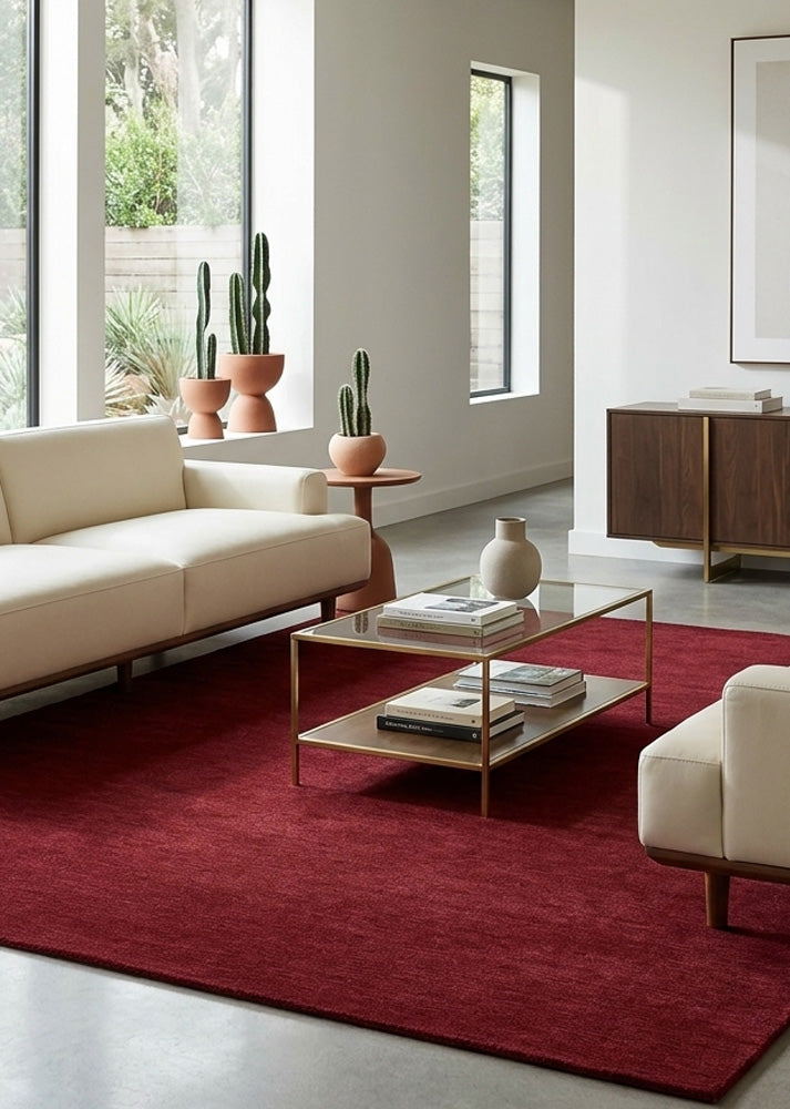 Minimalist Wool Rug in Garnet Red styled in a modern living room