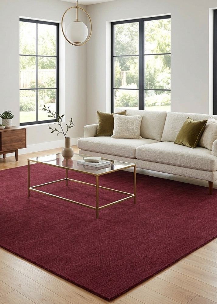 Minimalist Wool Rug in Maroon styled in a modern living room
